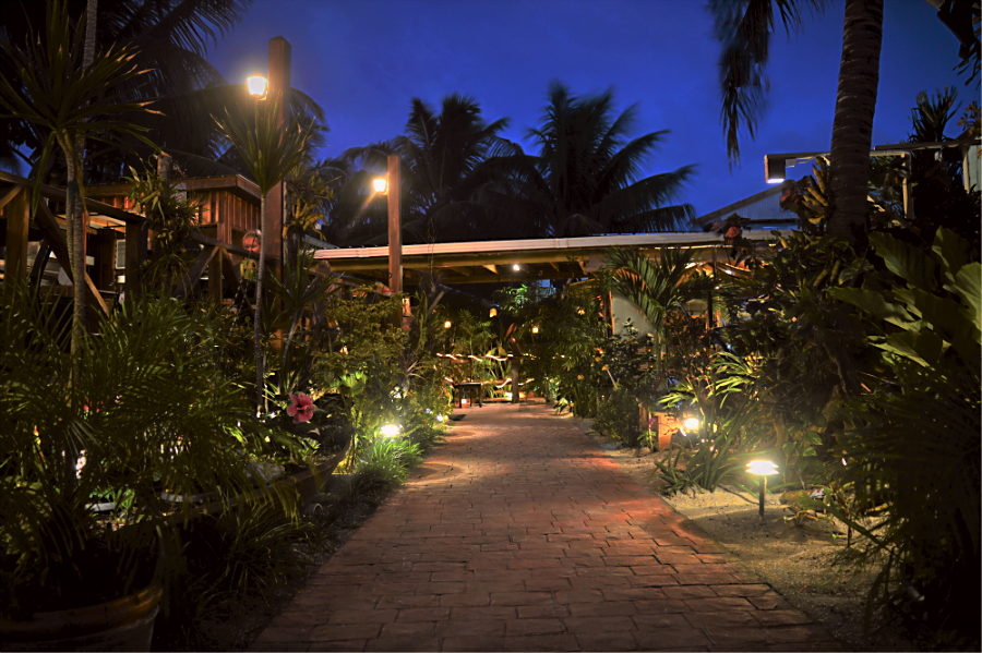 Tropical garden walkway in Il Pellicano restaurant, Caye Caulker, Belize