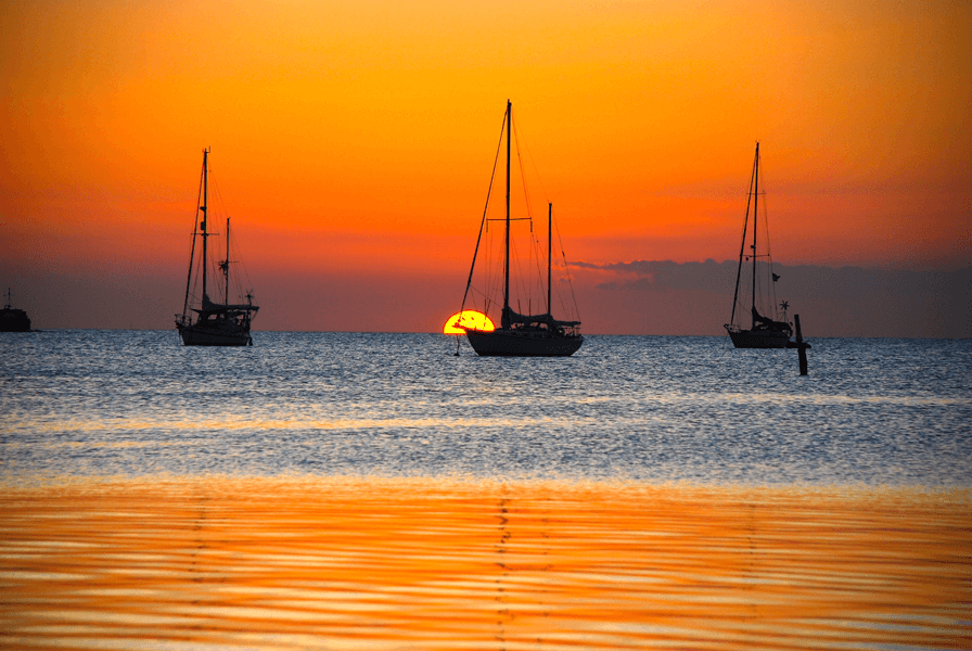 Gorgeous sunset with Belizean fishing boats